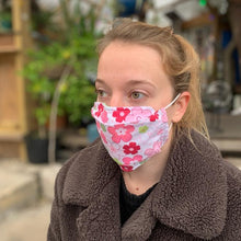 Load image into Gallery viewer, Picture of girl wearing 3-D faecmask in Daisies design.